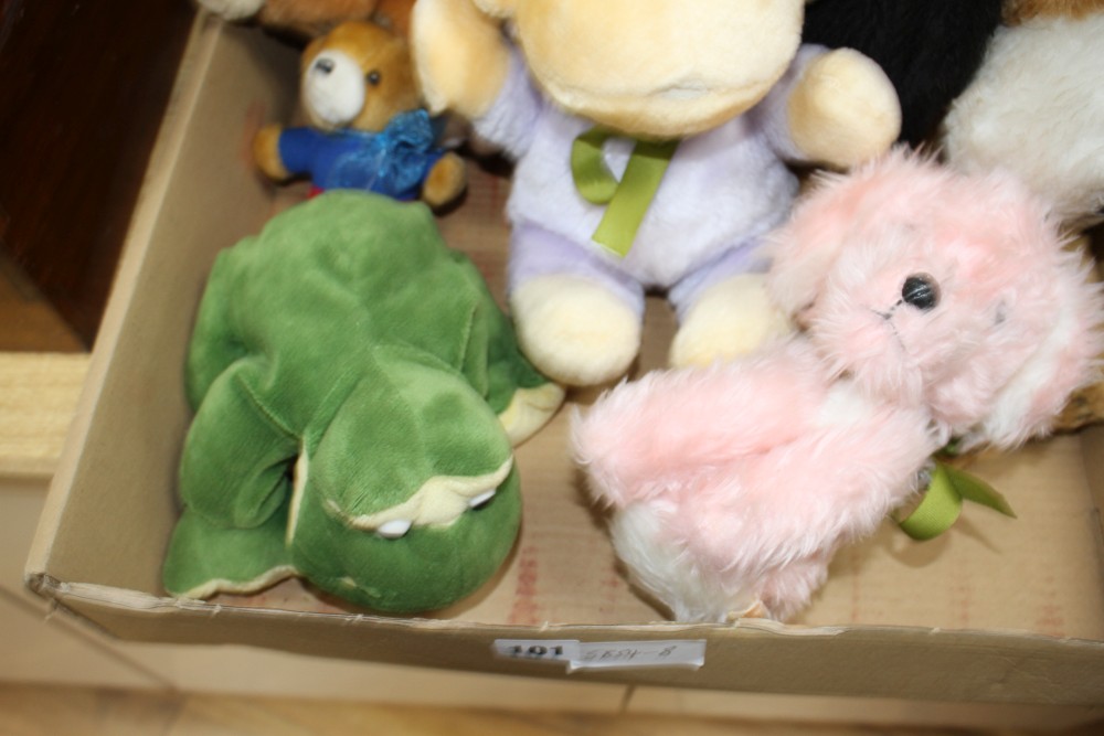 A group of assorted soft toys